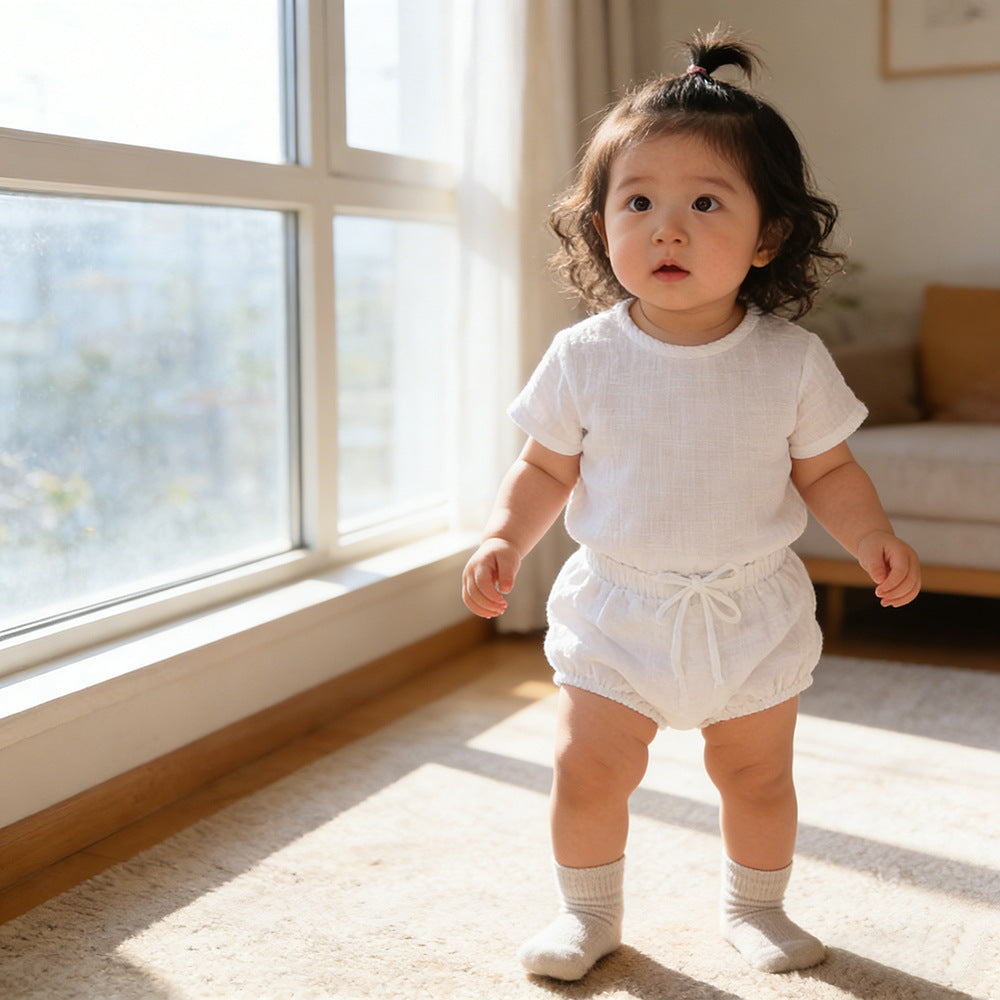 Two piece set of children's top with lace up PP pants